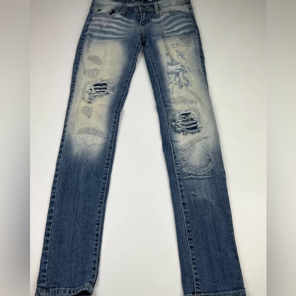 Distressed light wash jeans